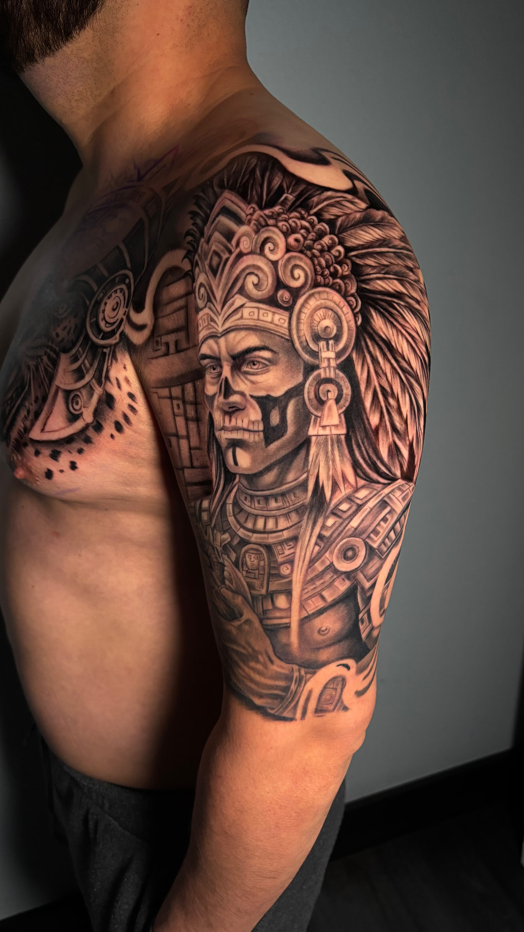 Black and grey Aztec warrior tattoo by Joey