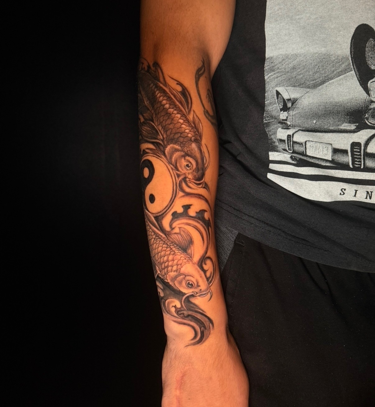 Black and grey koi and yin-yang tattoo by Quinn