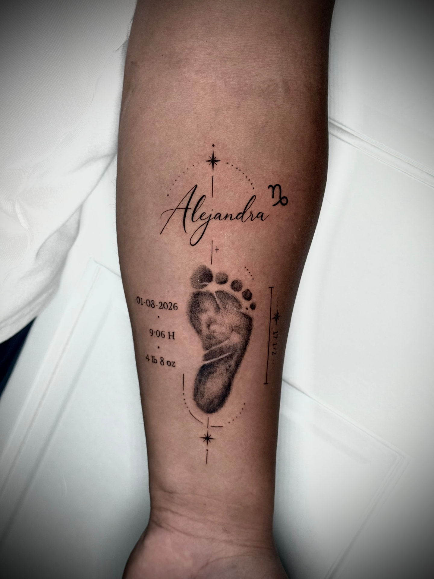 Baby footprint keepsake tattoo by Karen