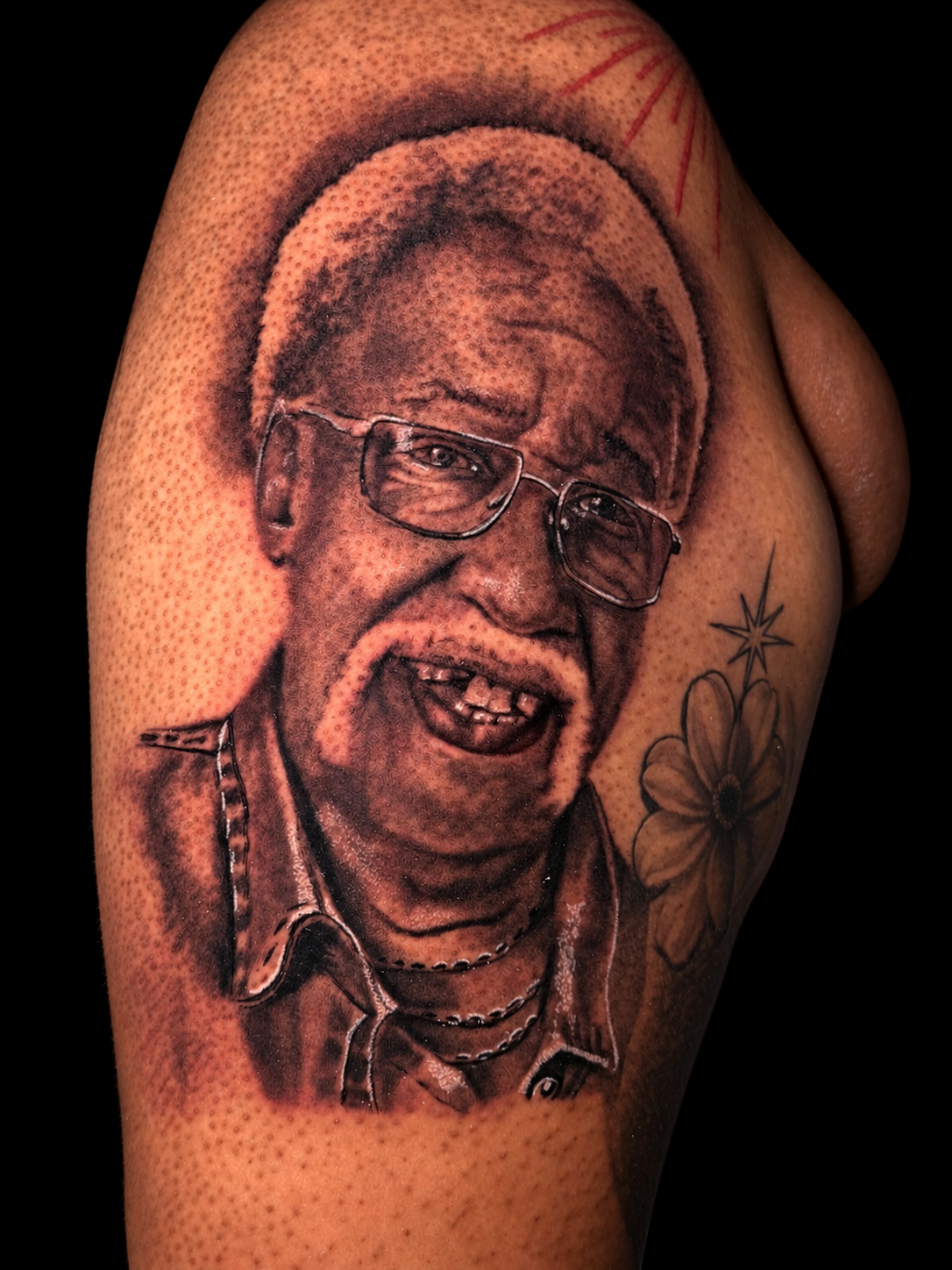 Black and grey memorial portrait tattoo by Dave