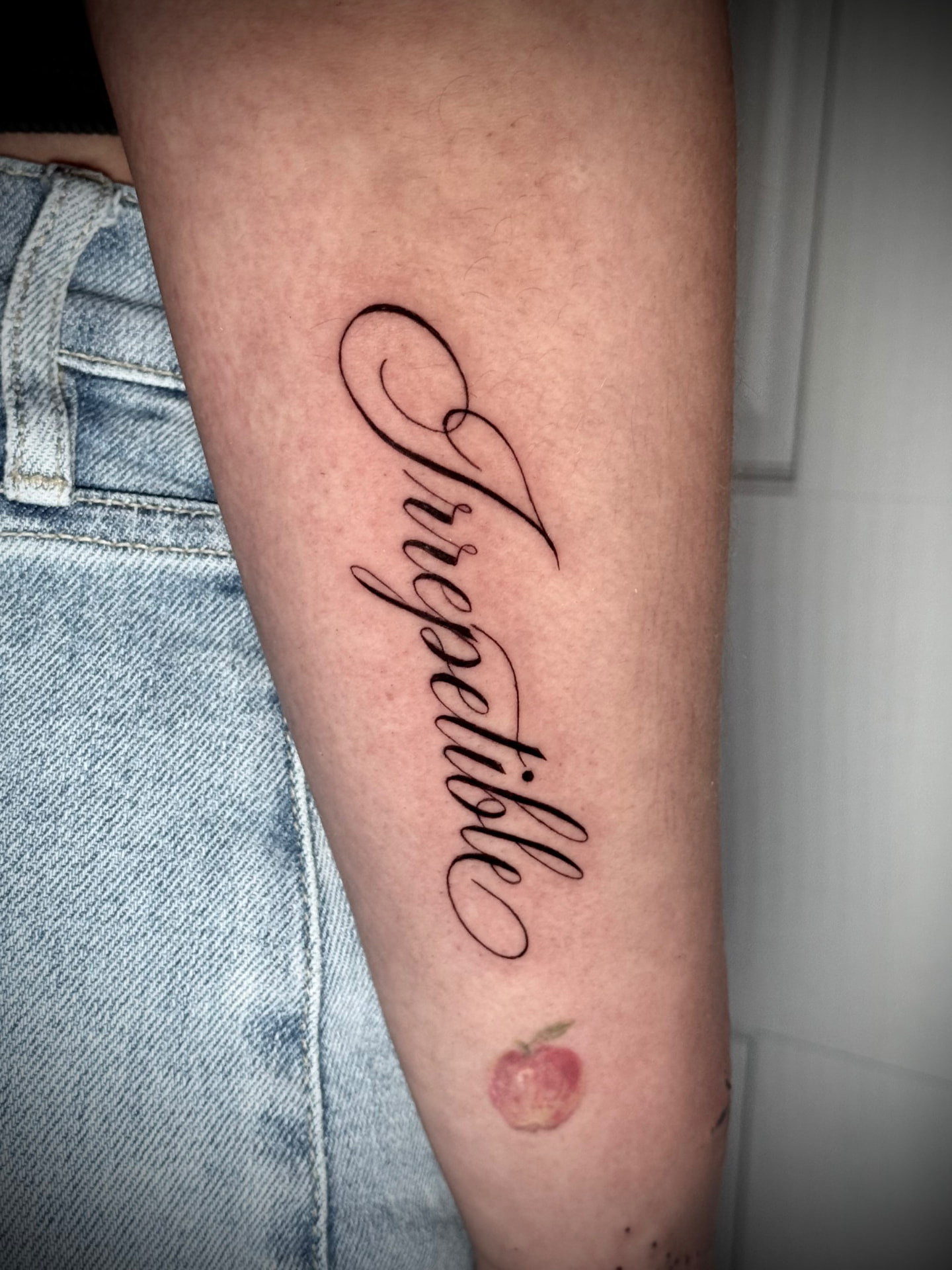 Script lettering tattoo by Karen
