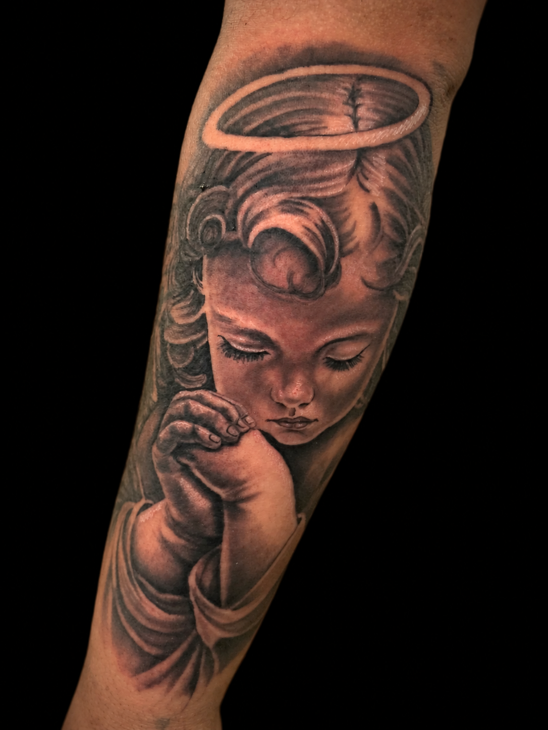 Black and grey angel tattoo by Dave